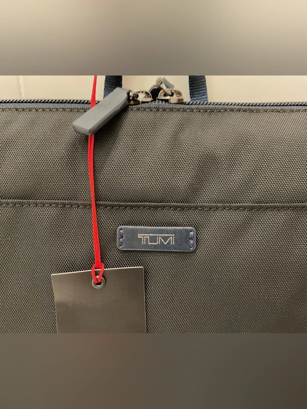 Tumi up sale